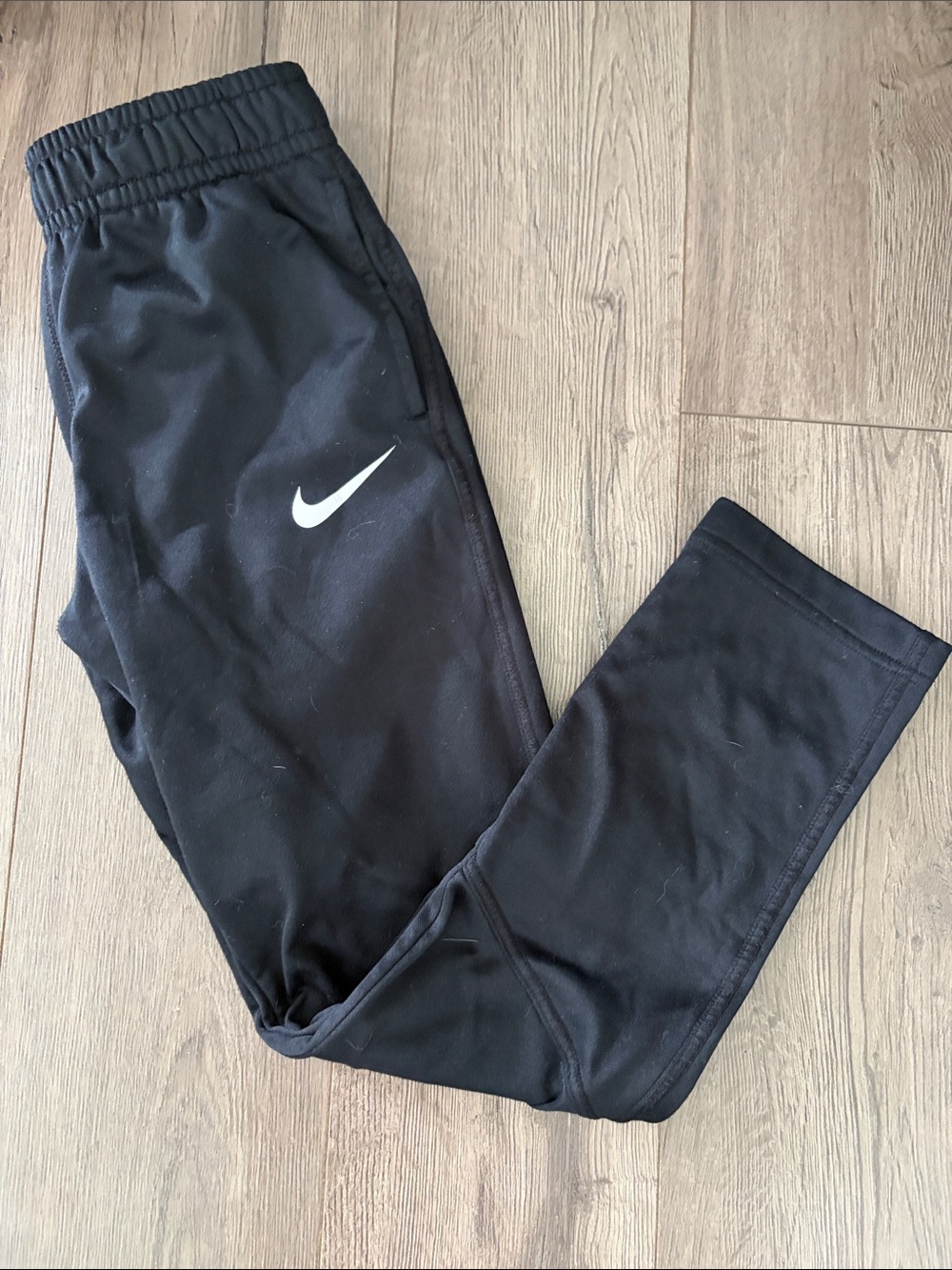 Nike Kids Black Therma Fit Pants with White Swoosh. Boy’s size medium